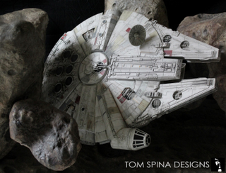 Illustration for article titled I Need This Millennium Falcon Asteroid Field Coffee Table In My Life